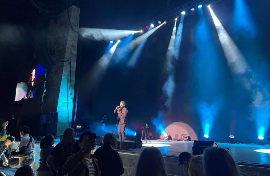 Comedian Trevor Noah on stage.