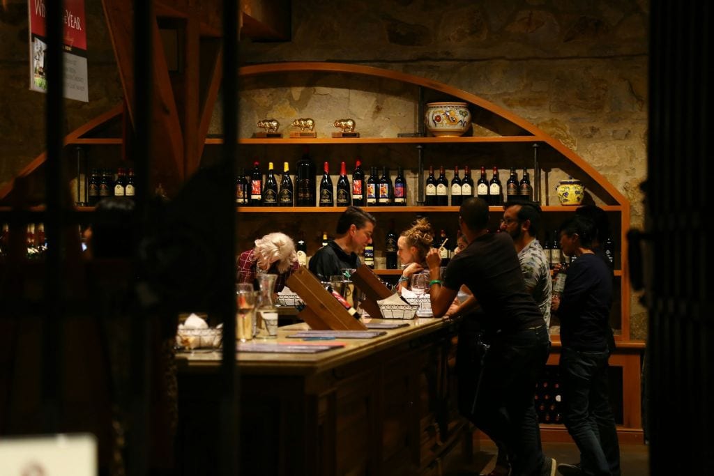 The basement of a winery where people drink wine on a San Francisco to Napa tour.
