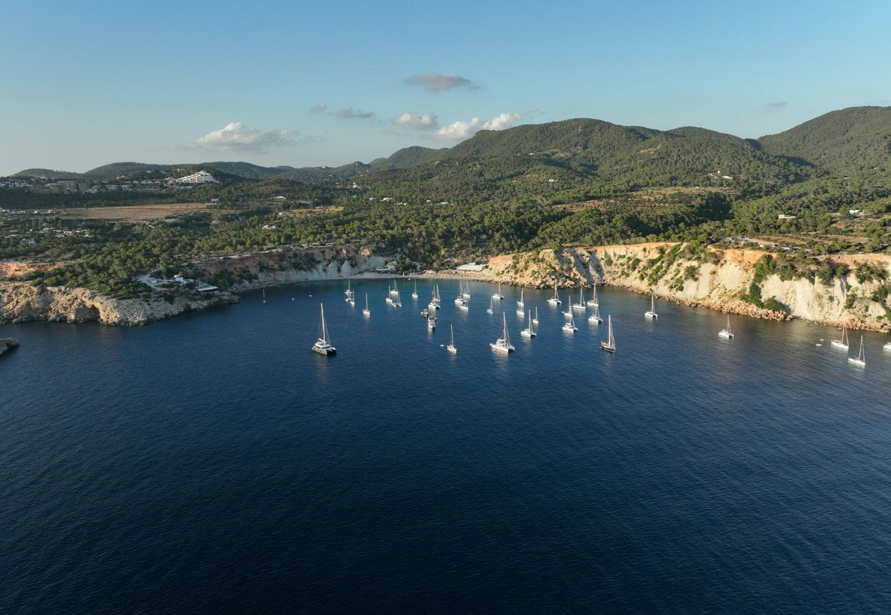 An aerial view of Catalina Island with many boats in the harbor.